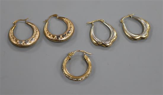 Two pairs of 9ct gold loop earrings and one odd 9ct gold earring.